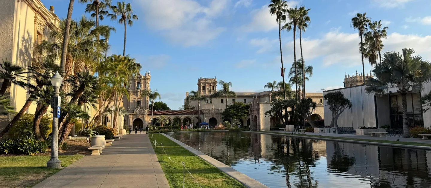 Balboa Park arcades, gardens, and reflecting pool in San Diego