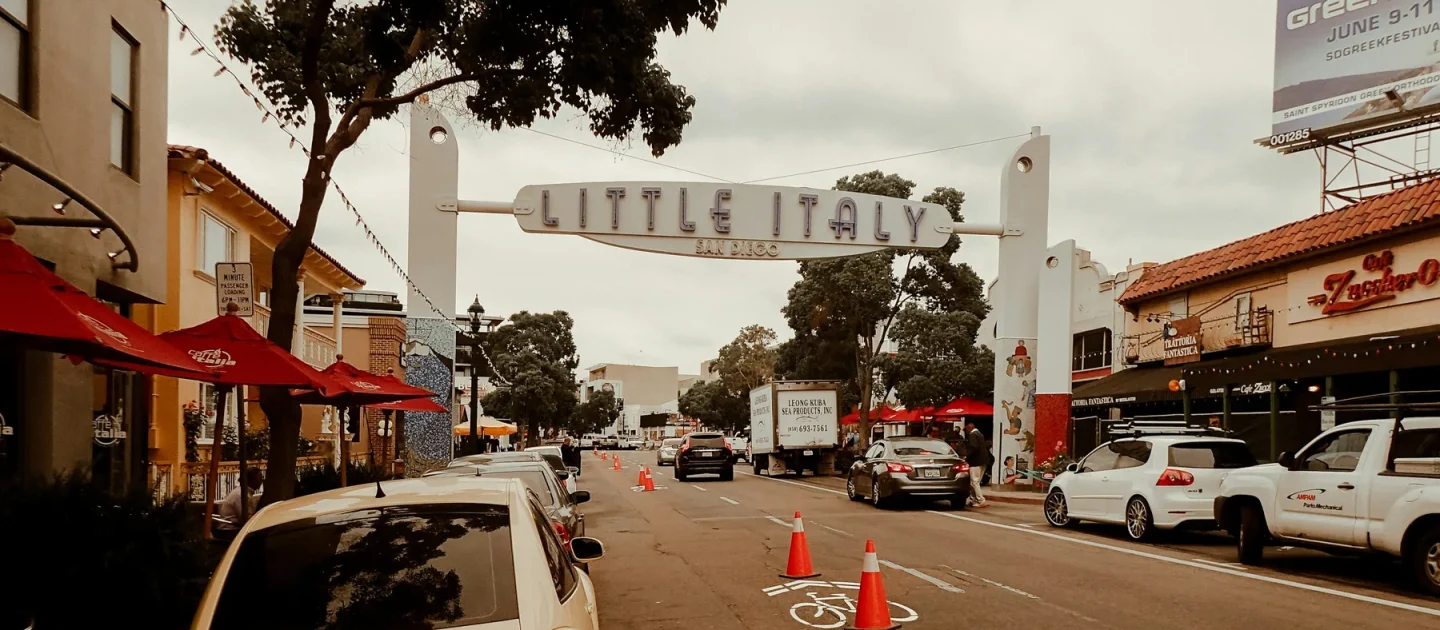 Street view beneath the Little Italy sign in San Diego